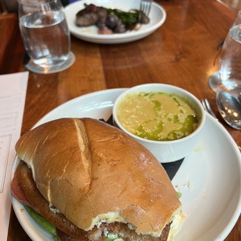 Range - BBLT sandwich with corn chowder.  Lunch steak in the back - Steakhouses Near Me - San Antonio, Texas