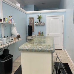 Bare Waxing Studio - The waxing room (see the vodka in the back? Super nice touch! )
