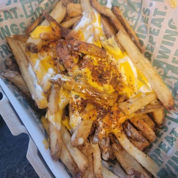 Wingstop - Large voodoo fries - Chicken Wings Near Me - Richmond, Virginia Wingstop - Large voodoo fries - Chicken Wings Near Me - Richmond, Virginia