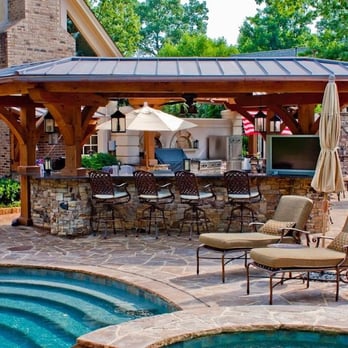 CGT - a patio with a bar and a pool - Landscaping Near Me CGT - a patio with a bar and a pool - Landscaping Near Me