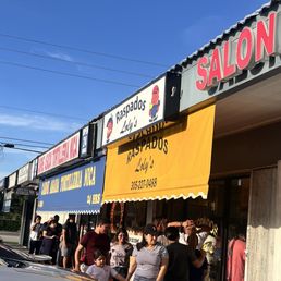 Store Front Packed waiting to get in on a Sunday afternoon!