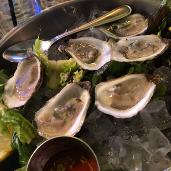 St. John's Fish Exchange - 6 oysters. Kind of a messy presentation. At this price point an oyster fork would be good. - Seafood Near Me - St. John's, Newfoundland and Labrador St. John's Fish Exchange - 6 oysters. Kind of a messy presentation. At this price point an oyster fork would be good. - Seafood Near Me - St. John's, Newfoundland and Labrador