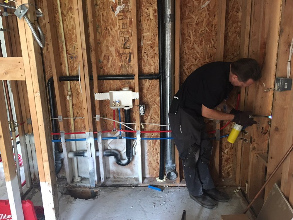 Slide of Compass Plumbing & Drain Services