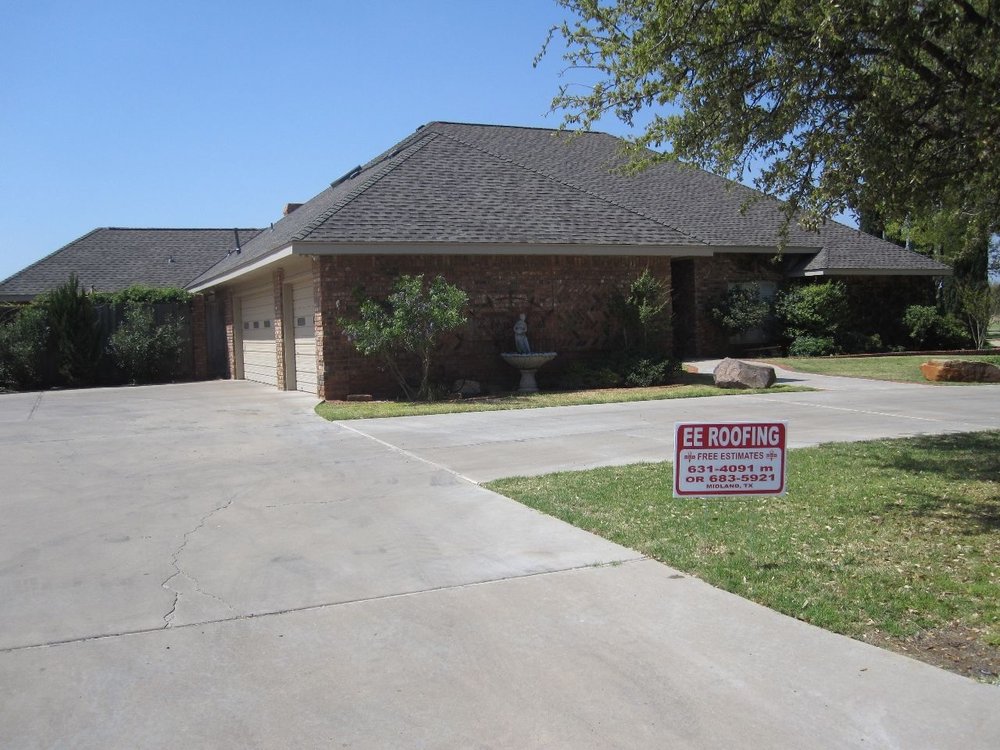 Slide of E E Roofing