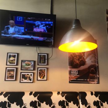 Vera's Burger Shack - Wall pic of huge stack of burgers. Old contest to how many can you eat. - Burgers Near Me - Vancouver, British Columbia Vera's Burger Shack - Wall pic of huge stack of burgers. Old contest to how many can you eat. - Burgers Near Me - Vancouver, British Columbia