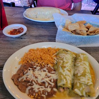 La Peña Mexican Grill - Poblano chicken enchiladas and California burrito covered in queso in the back - Mexican Near Me - Temecula, California