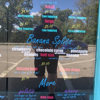 The Canalside Cup - a man standing in front of a store window - Ice Cream & Frozen Yogurt Near Me - Williams Township, Pennsylvania