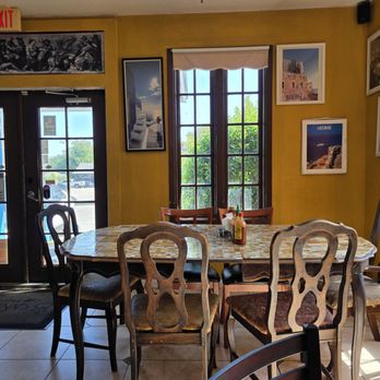 Santorini Cafe - Indoor seating by the entrance - Greek Near Me - Austin, Texas Santorini Cafe - Indoor seating by the entrance - Greek Near Me - Austin, Texas