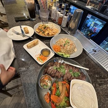 Sisters Thai - Pad Thai, Spring Rolls, Pineapple Fried Rice with Chicken and Shrimp, and Crying Tiger (Beef Steak) - Thai Near Me - Fairfax, Virginia Sisters Thai - Pad Thai, Spring Rolls, Pineapple Fried Rice with Chicken and Shrimp, and Crying Tiger (Beef Steak) - Thai Near Me - Fairfax, Virginia