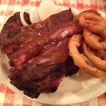 Mesquite Pit - extreme CLOSE UP! (sausage link is just below the ribs) - Barbeque Near Me - Mineral Wells, Texas Mesquite Pit - extreme CLOSE UP! (sausage link is just below the ribs) - Barbeque Near Me - Mineral Wells, Texas