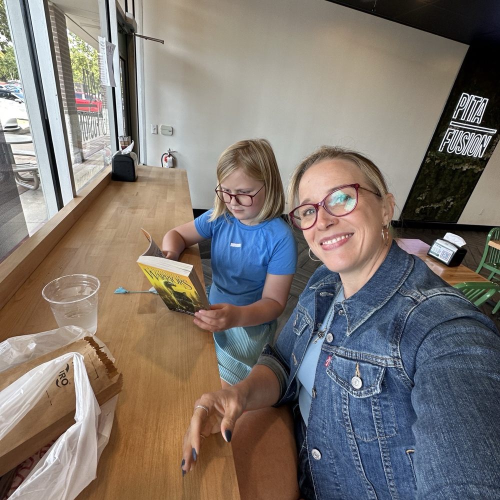 Pita Fusion - Ny daughter and me at the barstools by the window - Mediterranean Near Me - Round Rock, Texas