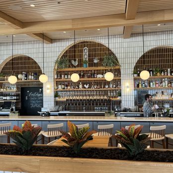 Tupelo Honey Southern Kitchen & Bar - Bar area - New American Near Me - Irving, Texas Tupelo Honey Southern Kitchen & Bar - Bar area - New American Near Me - Irving, Texas