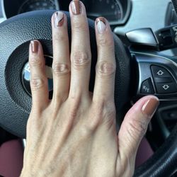 Millennium Nails - Judy is so good and very detailed. My mani pedi never lifts of breaks weeks after its done.