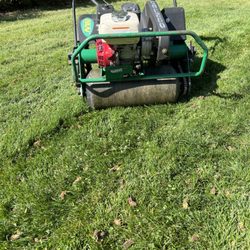 Green Earth Aeration - Heavy commercial aerators are used to pull the deepest plugs possible