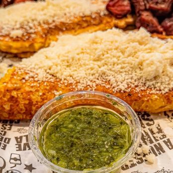 Venezuela Mia - a plate of food with a side of salsa - Venezuelan Near Me - Sandy, Utah