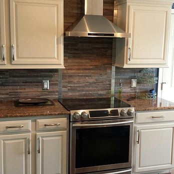 Steve's Onsite Services - After Oak Kitchen Cabinet Refinishing - no brush or roller marks - professionally sprayed for a factory finish - Handyman Near Me Steve's Onsite Services - After Oak Kitchen Cabinet Refinishing - no brush or roller marks - professionally sprayed for a factory finish - Handyman Near Me