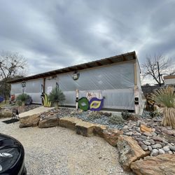 2 Old Crows - Parking lot looking at enclosed patio.