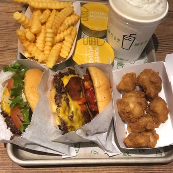 Shake Shack Perimeter Mall - Shack burger, SmokeShack, Chick'n bites, honey mustard, vanilla milkshake, and fries. - Burgers Near Me - Atlanta, Georgia Shake Shack Perimeter Mall - Shack burger, SmokeShack, Chick'n bites, honey mustard, vanilla milkshake, and fries. - Burgers Near Me - Atlanta, Georgia