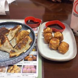 Fried pork gyoza, shrimp shumai, vanilla boba tea Fried pork gyoza, shrimp shumai, vanilla boba tea