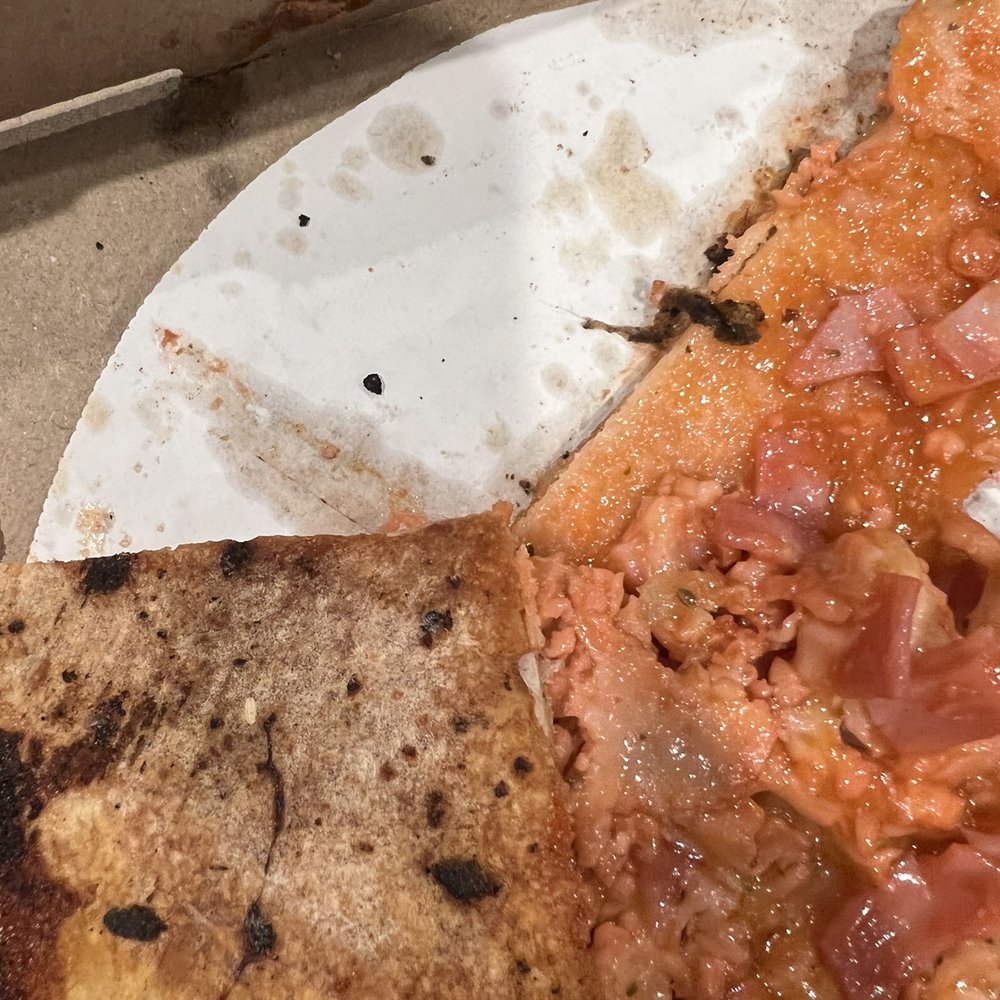 Pizza King - a half eaten pizza in a box - Pizza Near Me - Chesterfield, Indiana Pizza King - a half eaten pizza in a box - Pizza Near Me - Chesterfield, Indiana