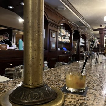Kitty O'Sheas - a drink on the bar - Irish Near Me - Chicago, Illinois Kitty O'Sheas - a drink on the bar - Irish Near Me - Chicago, Illinois