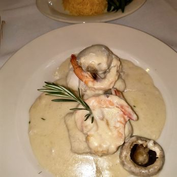 Marbella Restaurant - Flounder stuffed with shrimp in a white wine champagne sauce - Spanish Near Me - Bayside, New York Marbella Restaurant - Flounder stuffed with shrimp in a white wine champagne sauce - Spanish Near Me - Bayside, New York