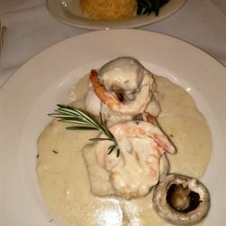 Marbella Restaurant - Flounder stuffed with shrimp in a white wine champagne sauce