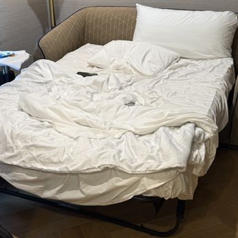 Delamar Mystic - The fold out bed with four inch mattress. Only came with sheets. - Hotels Near Me - Mystic, Connecticut Delamar Mystic - The fold out bed with four inch mattress. Only came with sheets. - Hotels Near Me - Mystic, Connecticut