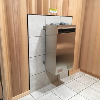 Avery Enterprise - a stainless steel dishwasher in a wood paneled bathroom - Decks & Railing Near Me - Stow, Ohio
