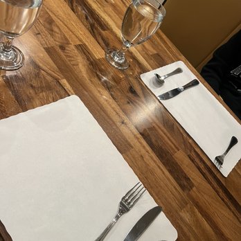 Mela Indian Restaurant - Paper place mats, silverware, and water - Indian Near Me - Indianapolis, Indiana Mela Indian Restaurant - Paper place mats, silverware, and water - Indian Near Me - Indianapolis, Indiana