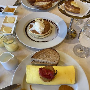 Tableau - Spanish omelet with guacamole/salsa/cheddar, hash brown on top. Lemon ricotta pancakes in the middle. Tableau breakfast across - Breakfast & Brunch Near Me - Las Vegas, Nevada