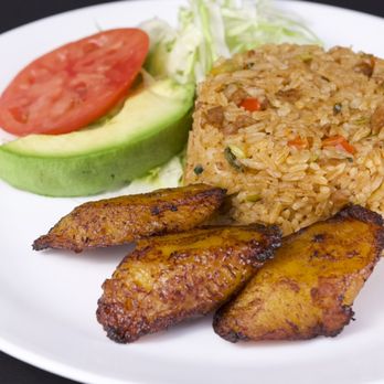 Planteles - a plate of food with rice and avocado - Vegan Near Me - Secaucus, New Jersey