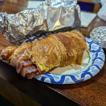 Kristin’s Vanilla Bakery - Breakfast croissant has thick bacon, egg patty, and cheese - Bakeries Near Me - Deer Lodge, Montana Kristin’s Vanilla Bakery - Breakfast croissant has thick bacon, egg patty, and cheese - Bakeries Near Me - Deer Lodge, Montana