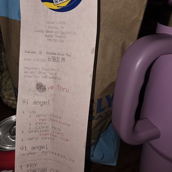 Culver's - Dinner - A Culver's drive-thru receipt from Greeley, CO, shows ordered food items and totals, with a pink pig-shaped object partially visible. - Fast Food Near Me - Greeley, Colorado