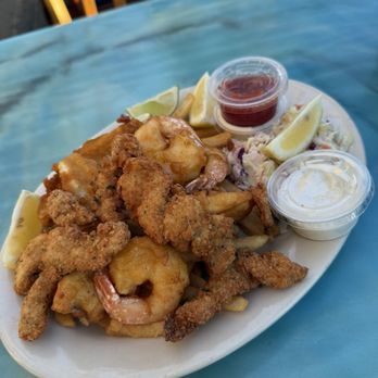 Sea Harvest - Seafood and chips mixture - fish (halibut), shrimp, and calamari - Seafood Near Me - Moss Landing, California Sea Harvest - Seafood and chips mixture - fish (halibut), shrimp, and calamari - Seafood Near Me - Moss Landing, California