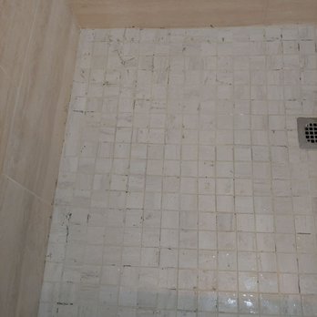 Davis Floor Covering - This shows morter that won't come off the tile floor. The picture doesnt show how uneven the floor is. - Flooring Near Me - Fort Smith, Arkansas Davis Floor Covering - This shows morter that won't come off the tile floor. The picture doesnt show how uneven the floor is. - Flooring Near Me - Fort Smith, Arkansas