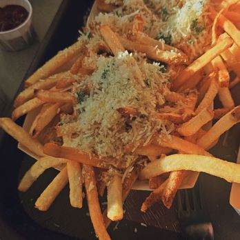 Cosmic Ray's Starlight Café - Garlic Fries - Sandwiches Near Me - Orlando, Florida Cosmic Ray's Starlight Café - Garlic Fries - Sandwiches Near Me - Orlando, Florida