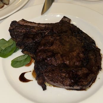 The Capital Grille - Porcini-Rubbed Bone-In Ribeye with 15-Year Aged Balsamic - Steakhouses Near Me - Charlotte, North Carolina The Capital Grille - Porcini-Rubbed Bone-In Ribeye with 15-Year Aged Balsamic - Steakhouses Near Me - Charlotte, North Carolina