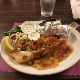 Crab stuffed fish, baked potato and coleslaw Crab stuffed fish, baked potato and coleslaw