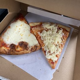 Plain slice of pizza with extra cheese Plain slice of pizza with extra cheese