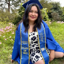 Mychal's Printing & Embroidery - Graduation photo with the finished embroidered sash!