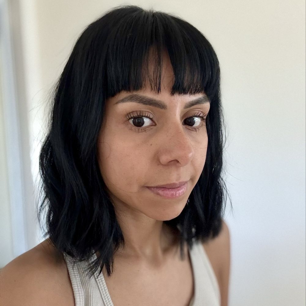 Soft layered cut with bangs styles in waves