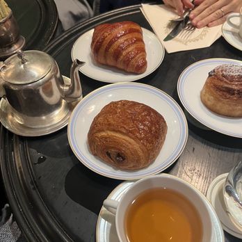 Ladurée - Rose Croissant, Pain au Chocolat, Roulé chocolate noisette, and thé oolang à la fleur d'Oranger - Tea Rooms Near Me - New York, New York