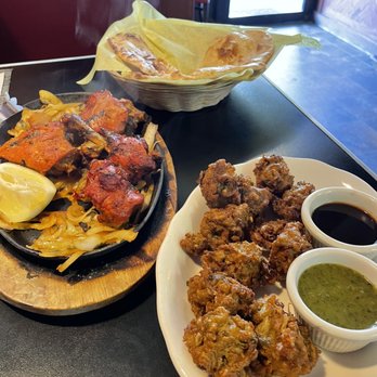 Tandoori Bites - 36. Tandoori Chicken 2. Vegetable Pakora Plain 28. Naan - Indian Near Me - Bellingham, Washington