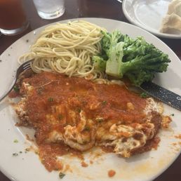 Salad, Chicken Parmigiana plate, and Beef Lasagna. Salad, Chicken Parmigiana plate, and Beef Lasagna.