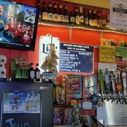 Waterhole Saloon - Menu (sort of) - food, current drafts and most of the bottles.