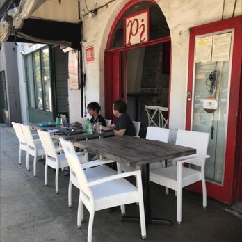 Pi On Sunset - two people sitting at a table outside a restaurant - Mediterranean Near Me - West Hollywood, California Pi On Sunset - two people sitting at a table outside a restaurant - Mediterranean Near Me - West Hollywood, California