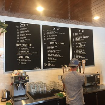 West Pecan Coffee + Beer - Menu of beer on tap, cans, wine, coffee, non-coffee, etc... not a huge selection but nice. - Bars Near Me - Pflugerville, Texas