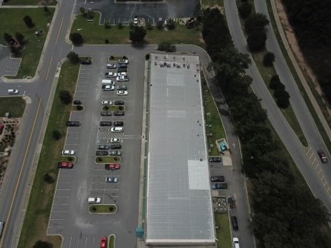 Slide of LandShark Roofing