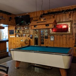 Crossroads Restaurant & Lounge - The pool table, complete with a log cabin overhead